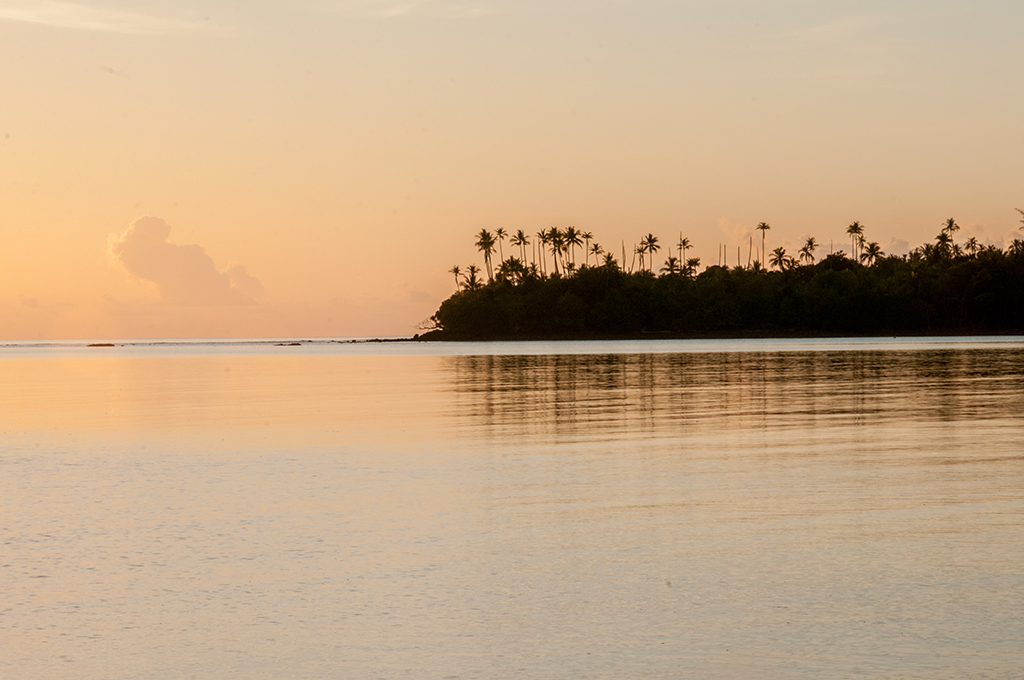 Bui island silhouette at sunset, Moluccas 